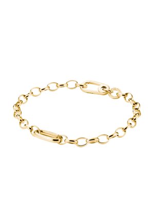 Delicate gold chain bracelet with oval and round links, featuring a small circular tag near the clasp.