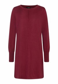 Robe tricotée bordeaux avec un col rond et des manches longues. Caractérisée par des poignets côtelés, une silhouette droite, une texture douce et sans ornements.