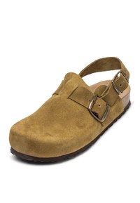 Suede, mustard yellow clog with a back strap, adjustable metal buckle, thick sole, and smooth, rounded toe. Textured surface.