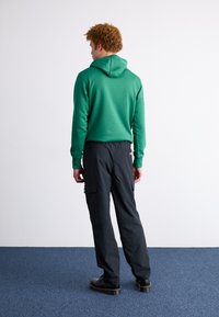 Ellesse TERATILO - Pantalon cargo - black