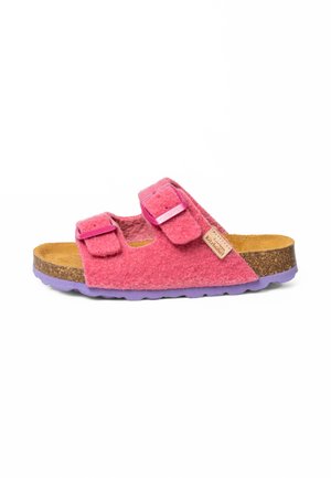 Infradito in feltro rosa con due cinturini regolabili, soletta in sughero e suola in gomma color lilla. Presenta un'etichetta con il logo sul lato.