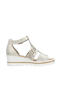 Wedge sandal in metallic silver faux leather, open toe design, cutout geometric pattern on side, white rubber sole with wave pattern.