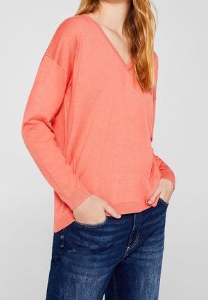 Stickad tröja - coral