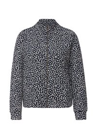 Veste zippée à motifs bleu marine et blanc avec col montant et manches longues, présentant un design abstrait tacheté.