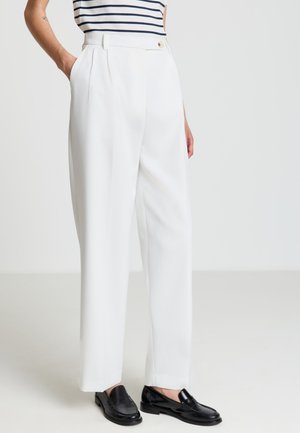 LUNGO TINTA UNITA - Stoffhose - bianco lana