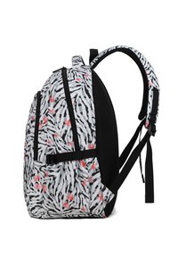 Zaino con un motivo a strisce bianche e nere ispirato alle zebre, rifinito con dettagli corallo, schienale in rete e numerosi scomparti con zip per riporre gli oggetti.