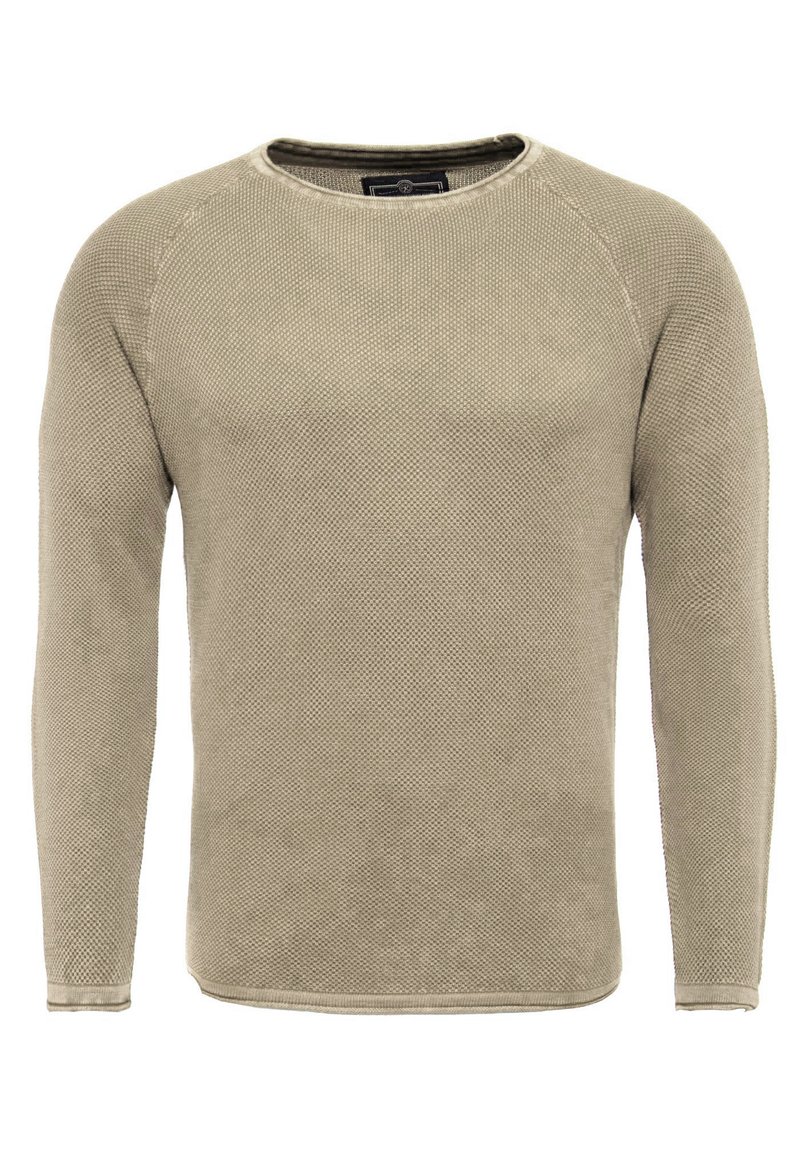 Maglione a maniche lunghe beige in maglia con tessuto testurizzato, collo rotondo e polsini a costine. Il design presenta una finitura liscia e un motivo uniforme.