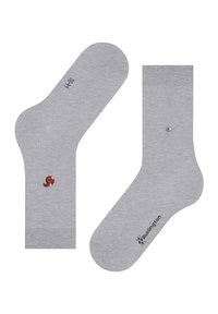 Calzini grigio chiaro con polsini a coste, un piccolo emblema con una volpe rossa su uno, e il testo nero "Burlington" sulla suola dell'altro.