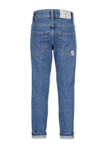 Blue denim jeans with two back pockets, rolled cuffs, and a white brand label on the waistband and right pocket.