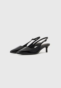 Black patent leather slingback shoes with pointed toes and a slim heel. Features a buckle strap and smooth, glossy surface.