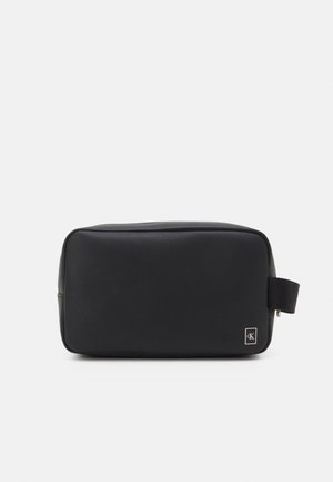 SLIM WASHBAG UNISEX - Wash bag - black
