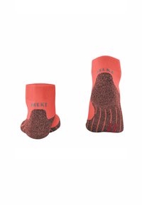 Koronkowe skarpetki kostkowe w kolorze koralowym z teksturowanym czarnym wzorem antypoślizgowym, wzmocnioną piętą i palcem, oraz marką "FALKE" na mankiecie. Miękka wykończenie z tkaniny.