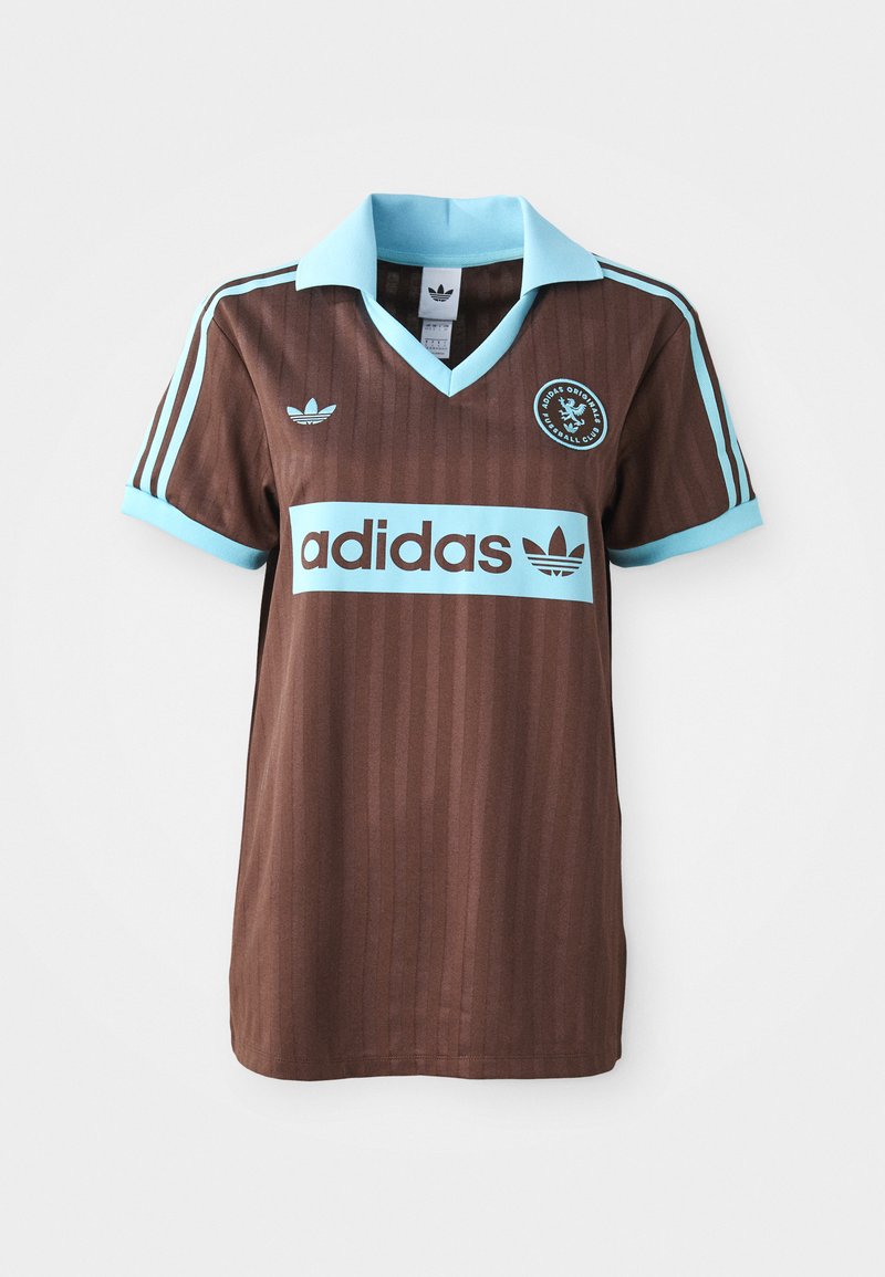 Jersey atlético marrón con un collar azul claro y acentos a rayas. Logo de "Adidas" exhibido de manera prominente en el pecho.