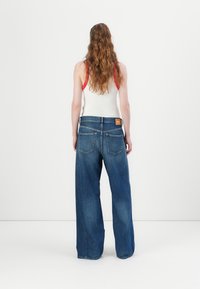 Replay NARJA PANTS - Relaxed fit jeans - medium blue