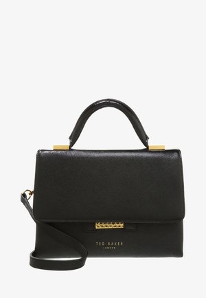 Sac à main Ted Baker en cuir noir avec une poignée supérieure, une bandoulière amovible et un fermoir et logo dorés à l'avant.