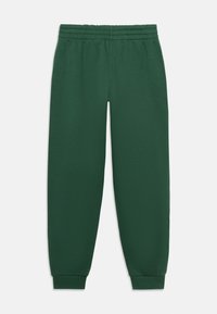 Pantalon de survêtement vert foncé à taille élastique avec chevilles resserrées, sans poches visibles ni logos, étalé à plat sur un fond blanc.
