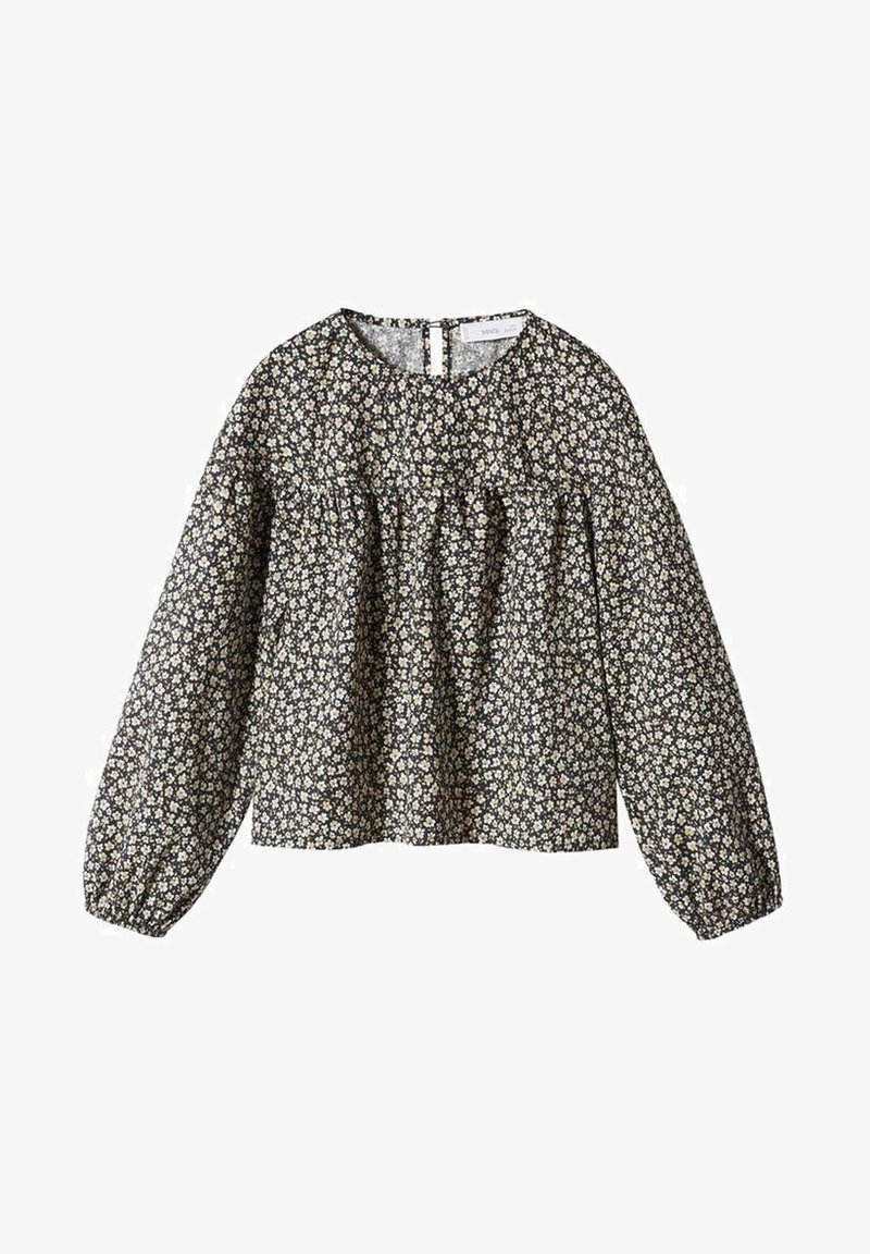 Blouse noire à manches longues avec imprimé floral blanc, col rond, empiècement froncé et poignets élastiqués.