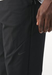 Nike Performance APS - Træningsbukser - black/sail