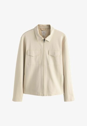 Bežna jakna na zadrgo s ovratnikom, dvema prsoma žepoma in stranskimi žepi. Narejena iz mehke tkanine z gladko teksturo.