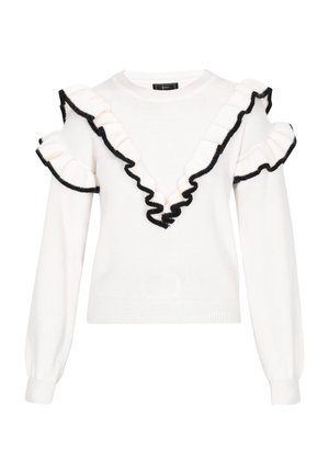 Baltas megztinis su giliu V formos iškirpimu, puoštu juodais volanų akcentais iškirptės ir rankovių kraštuose. Megzto audinio prijungtos ilgos, prigludusios rankovės.