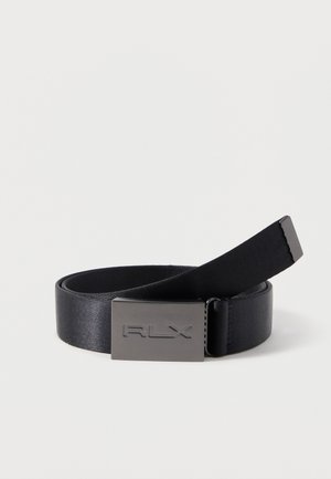 Μαύρη υφασμάτινη ζώνη τυλιγμένη με ορθογώνια μεταλλική αγκράφα χαραγμένη με το λογότυπο "RLX" σε απλό φόντο.
