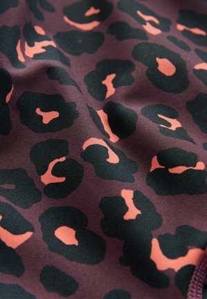 Patterned fabric featuring a dark purple background with black and peach leopard spots. Smooth texture with a slight sheen.