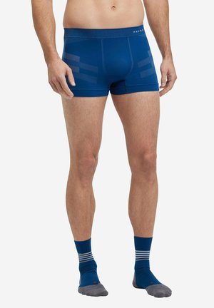 Boxer-briefs bleus en tissu doux avec une coupe ajustée, ornés de bandes rayées sur les côtés et d'une ceinture de marque.