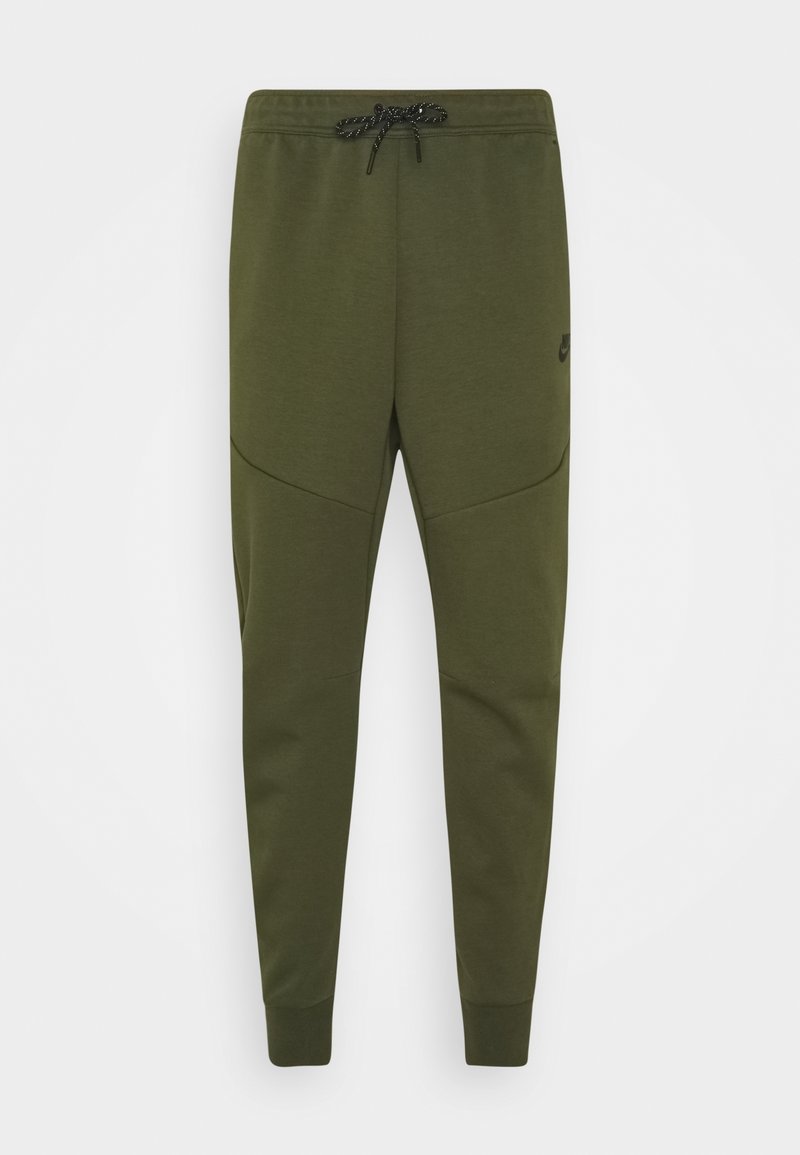 Olivgrüne sportliche Jogginghosen mit elastischem Bund, Kordelzug und schmalem Bein. Verfügt über Nahtdetails und ein Logo-Detail an den Oberschenkeln.