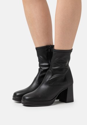 Platform ankle boots - black