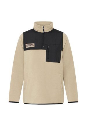 Beige fleecový pulovr s černým horním panelem, límcem na půl zip, zipovou náprsní kapsou a kontrastním černým lemem a manžetami.