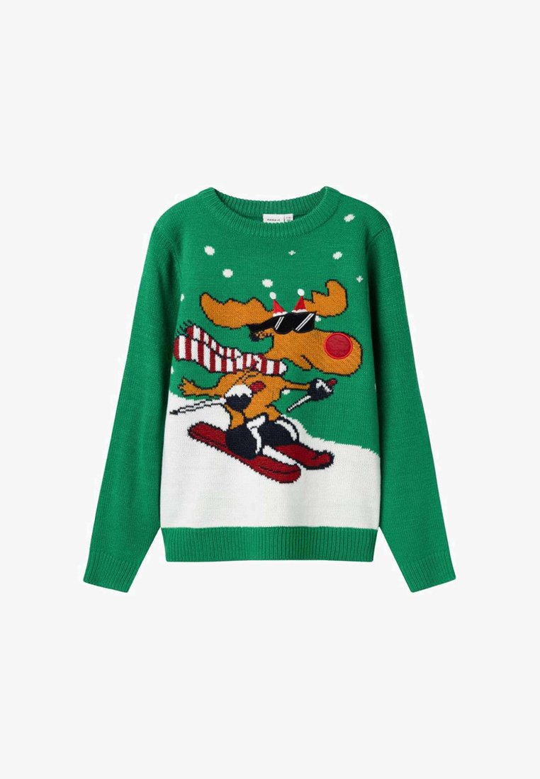 Pull en tricot vert avec un orignal en train de skier, doté d'un panneau inférieur blanc. L'orignal porte des lunettes de soleil et une écharpe rouge, avec des flocons de neige au-dessus.