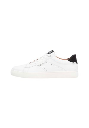 White leather sneaker with round toe, flat white sole, and black heel accent. Features perforated detailing and flat laces.