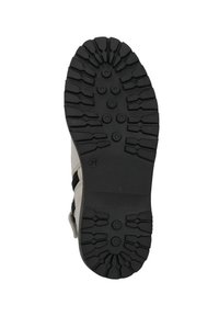 Suela de zapato de goma negra con surcos profundos y puntos de tracción circulares. Parte superior gris claro con acentos negros y cierre de cremallera lateral. Talla 37.
