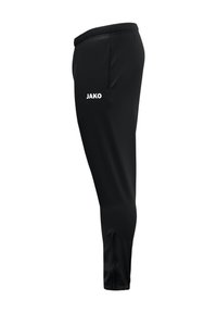 Pantalons de sport noirs avec un design fuselé, fabriqués dans un tissu lisse, présentant un logo "JAKO" blanc sur la cuisse gauche.