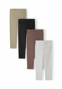 Vier paar geribbelde leggings in beige, zwart, bruin en lichtgrijs, overlappend gerangschikt op een witte achtergrond.
