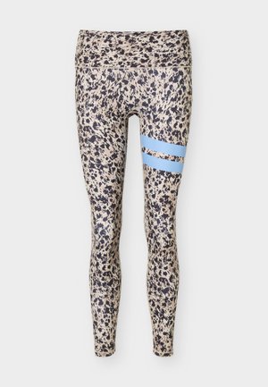 Colanți bej cu pete negre, talie înaltă, cu două dungi diagonale albastre deschis pe coapsa dreaptă, lungime completă.