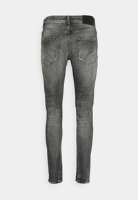 Tigha Vaqueros slim fit - grey