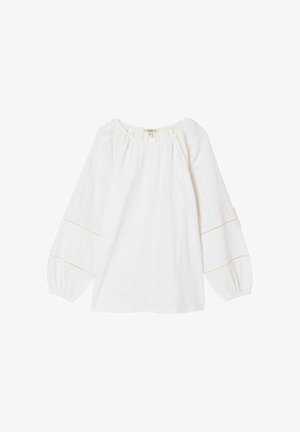 Weiße Bluse mit rundem Ausschnitt, elastischen Ballonärmeln, bestickten Details an den Ärmeln und goldfarbenen Zierstichen.