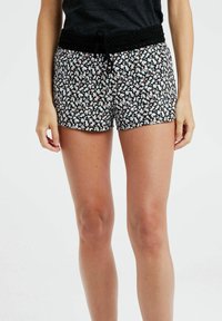 Svarta blommiga shorts med justerbar midja, en vävd texturbands och ett mönster av små, färgglada blommor på en mörk bakgrund.