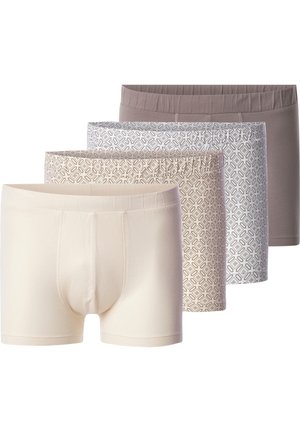 Four pairs of men's boxer shorts in various neutral colors: light cream, taupe, beige, and a patterned grey. Soft fabric with elastic waistbands.