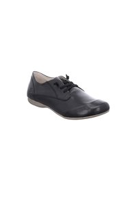 Zapato de cuero negro con punta redondeada, cordones en la parte delantera y plantillas suaves en color beige. Presenta un sutil detalle de costura y una suela plana y texturizada.