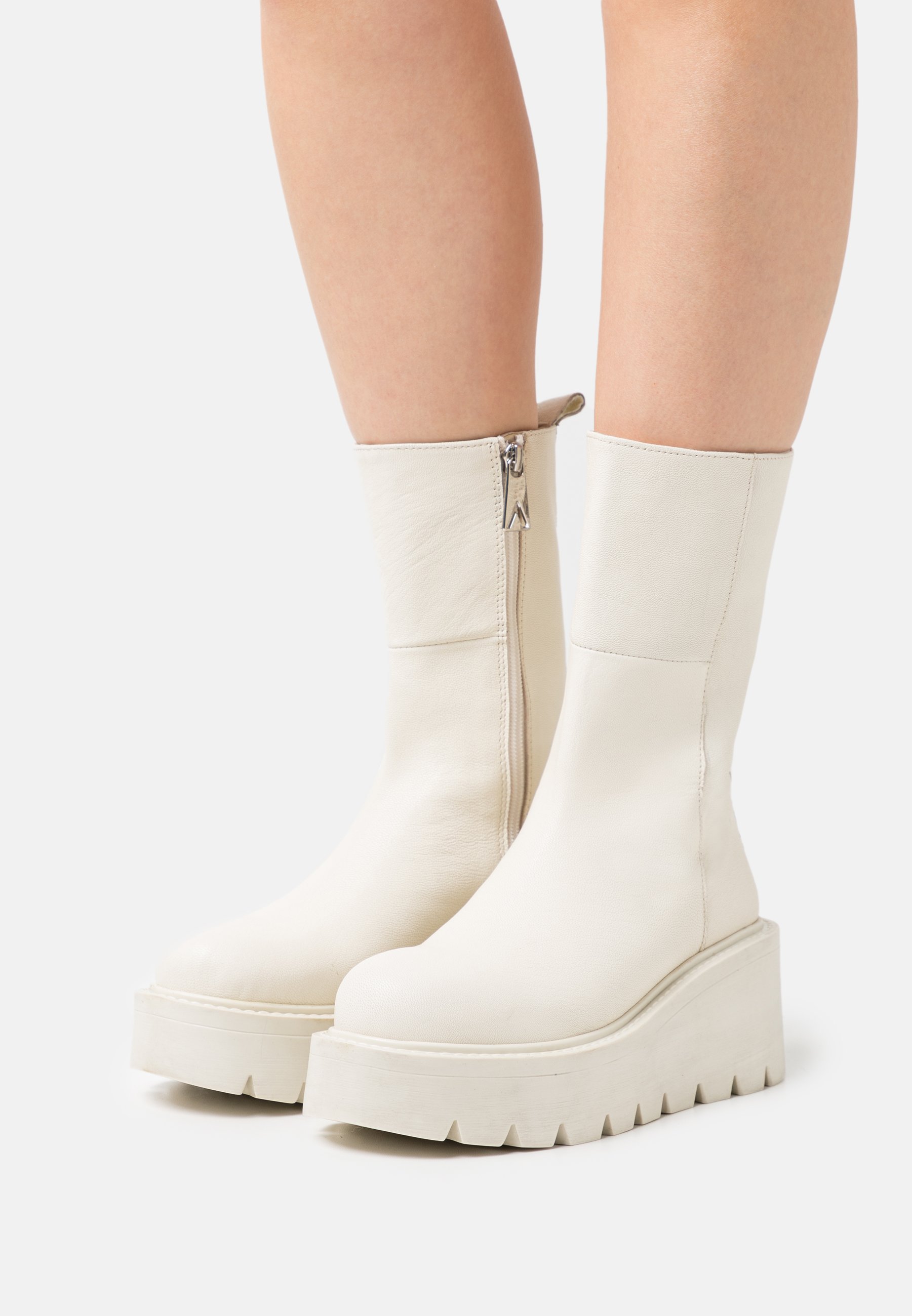 white wedge ankle boots