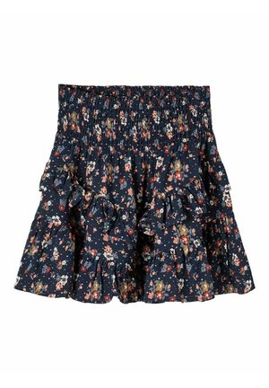 Marineblå blomster nederdel med smocket talje og lagdelte flæselag, med små blomster i røde, hvide, pink og sennepsfarvede nuancer.