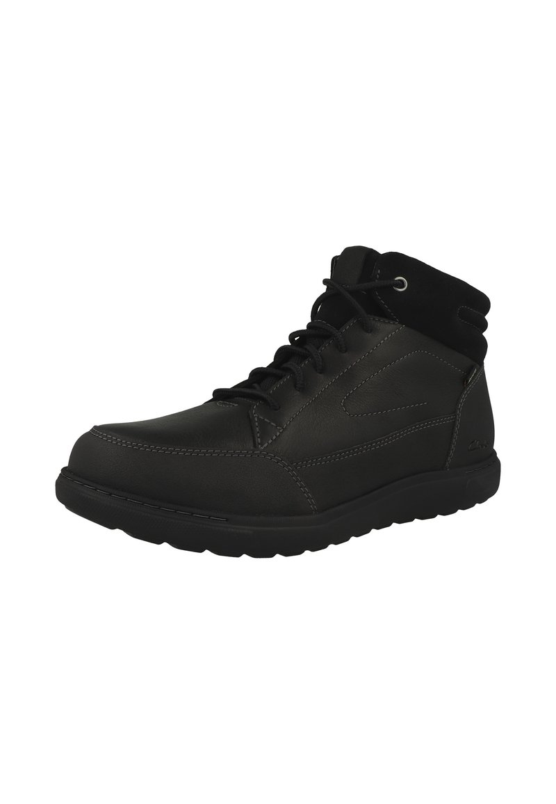 Schwarze halbhohe Schuhe aus Leder mit glatter Oberfläche. Verfügt über eine Schnürung vorne, eine runde Schuhspitze und einen strukturierten Knöchelkragen. Robuste Gummisohle.