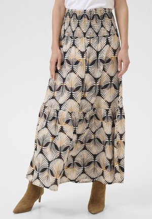Jupe maxi noire, avec un motif éventail crème et doré. Présente une taille smockée et un design en étages, fabriquée en tissu léger.