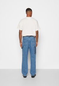 Tommy Jeans Jeans Relaxed Fit - light-blue denim