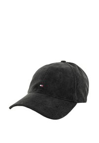 Gorra de béisbol de pana negra con visera curvada, superficie texturizada y un pequeño logo en rojo, blanco y azul en el panel frontal.