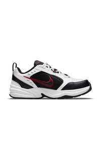 Scarpa da ginnastica bianca e nera con dettagli rossi, caratterizzata da una tomaia in mesh, collo imbottito e suola in gomma con trama antiscivolo.