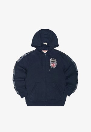 Sudadera con capucha azul marino con cremallera, bolsillos frontales, capucha con cordones, logo británico "Lonsdale" en el pecho y franjas con la marca a lo largo de las mangas.