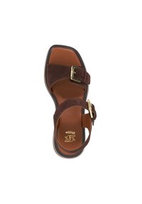 Brown suede sandal with a rectangular toe, two straps, and a gold buckle. The insole is tan leather, featuring embossed branding.